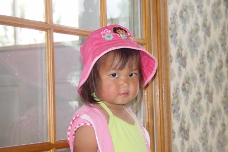 Kasen ready for the pool in her Dora hat